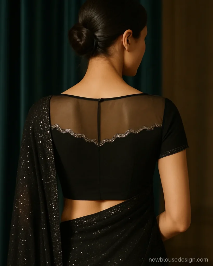 Black blouse back design with a sheer net yoke and sequin scallop line