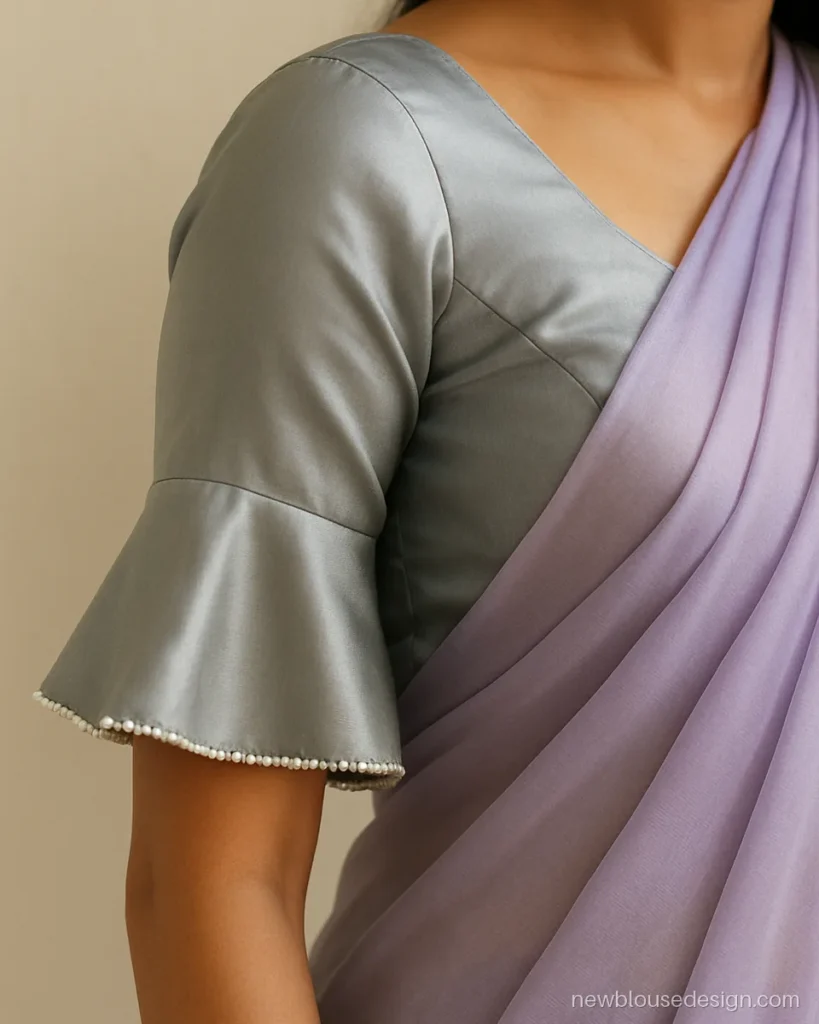 Silver grey satin blouse sleeve with short bell flare and pearl edge