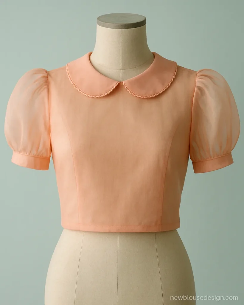 Front blouse design with a scalloped Peter Pan collar in peach organza over lining
