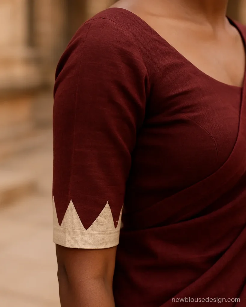 Kathpadar blouse hand design with temple border at the elbow on maroon cotton