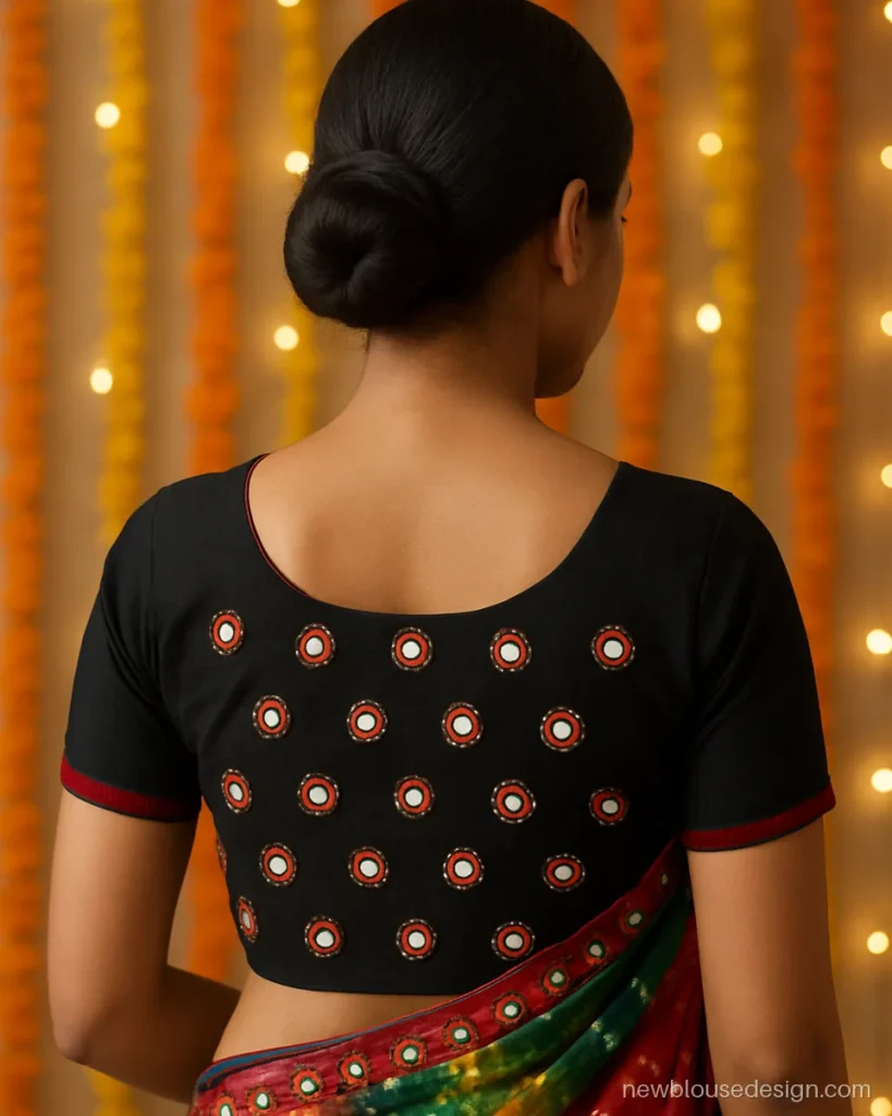 Mirror work blouse back design in black cotton with round shisha all over