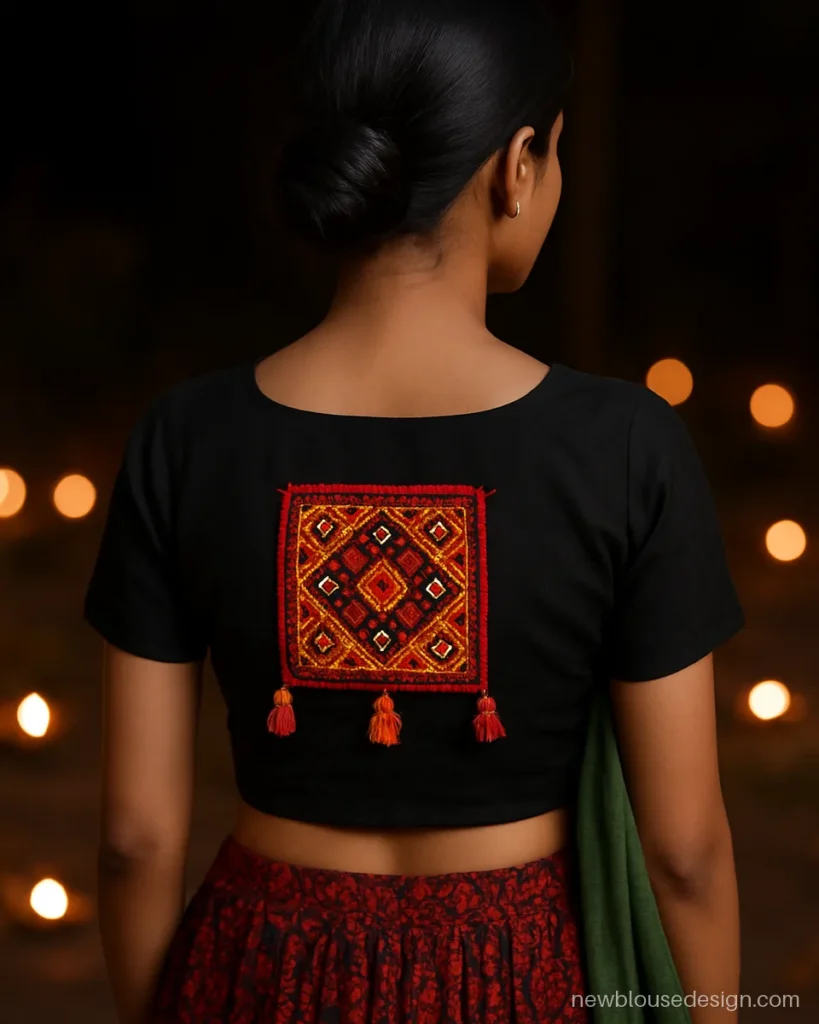 Black cotton choli back with square Kutch embroidery patch and tassels