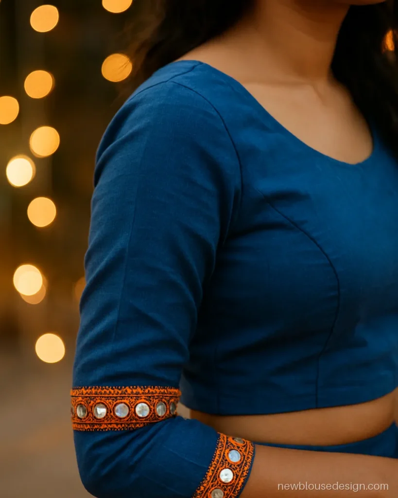 Royal blue choli with full sleeves and mirror work cuffs