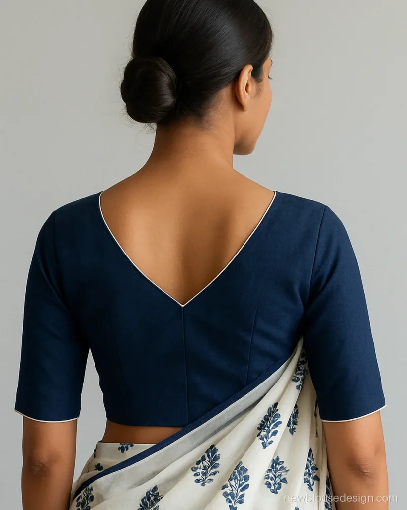 W neck blouse design in navy cotton silk with white piping on the back