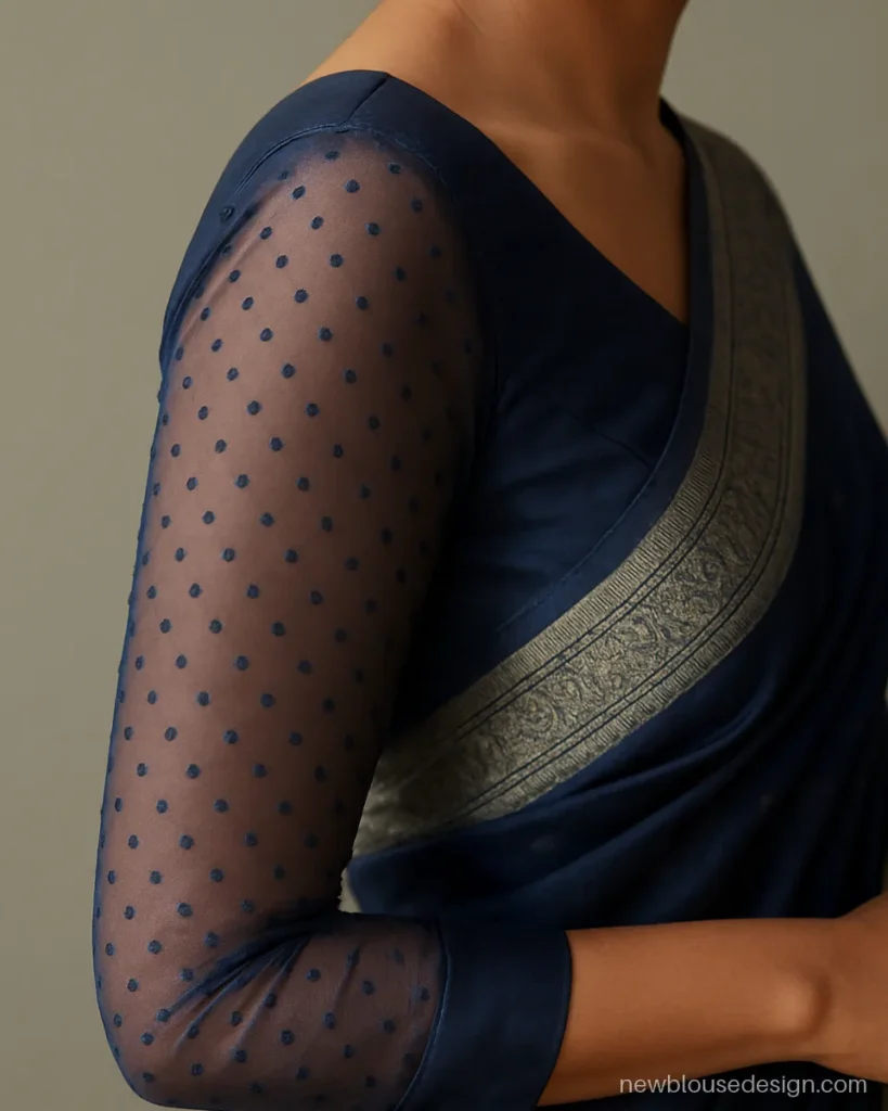Navy blue full sleeve net blouse with polka dot net and cuffed wrist
