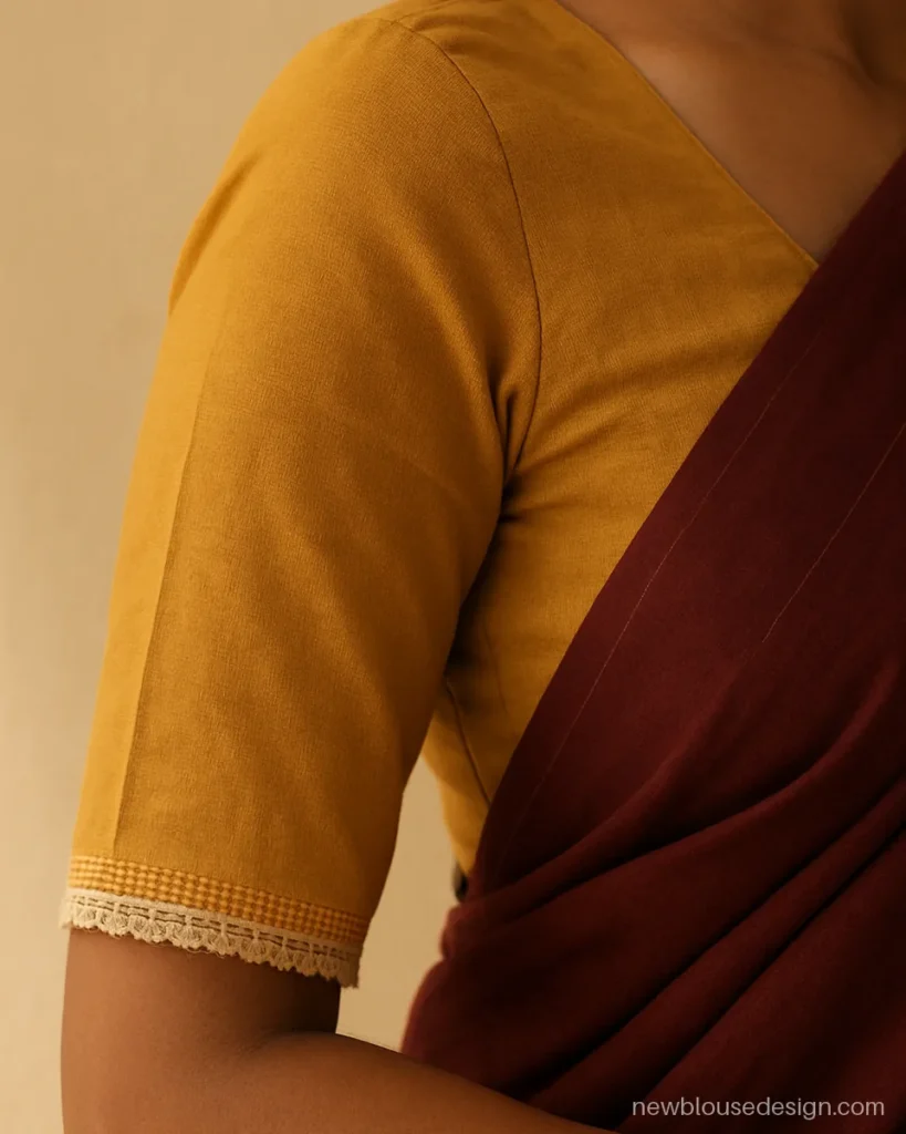 Mustard cotton elbow sleeve with a fine cotton lace edge