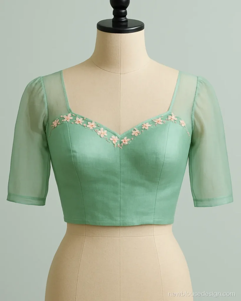 Mint organza blouse with a sweetheart neck and pastel thread flowers