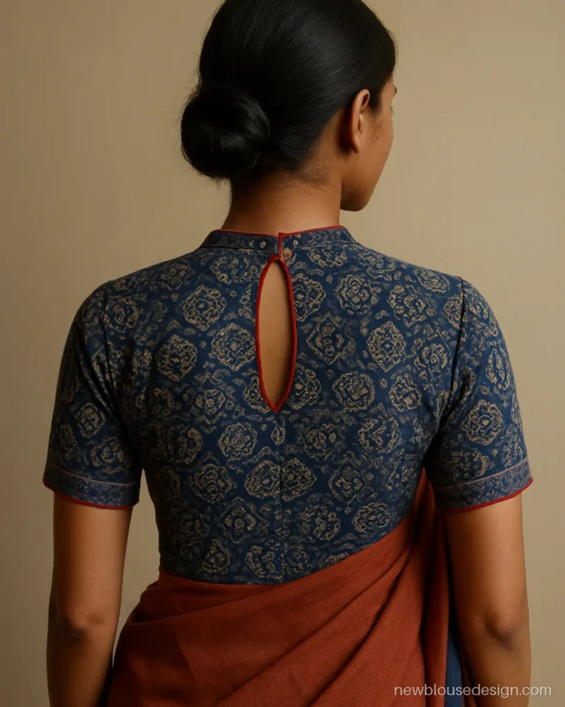 Indigo ajrakh blouse back design with a keyhole and wooden button