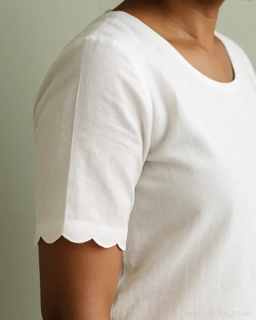 White cotton blouse sleeve with a scalloped hem, simple pattern blouse design