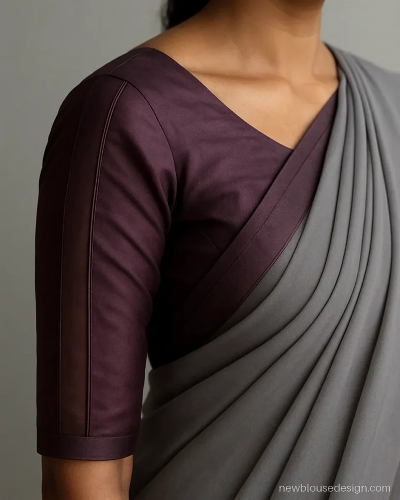Plum silk three quarter sleeve with a sheer net panel down the outer arm
