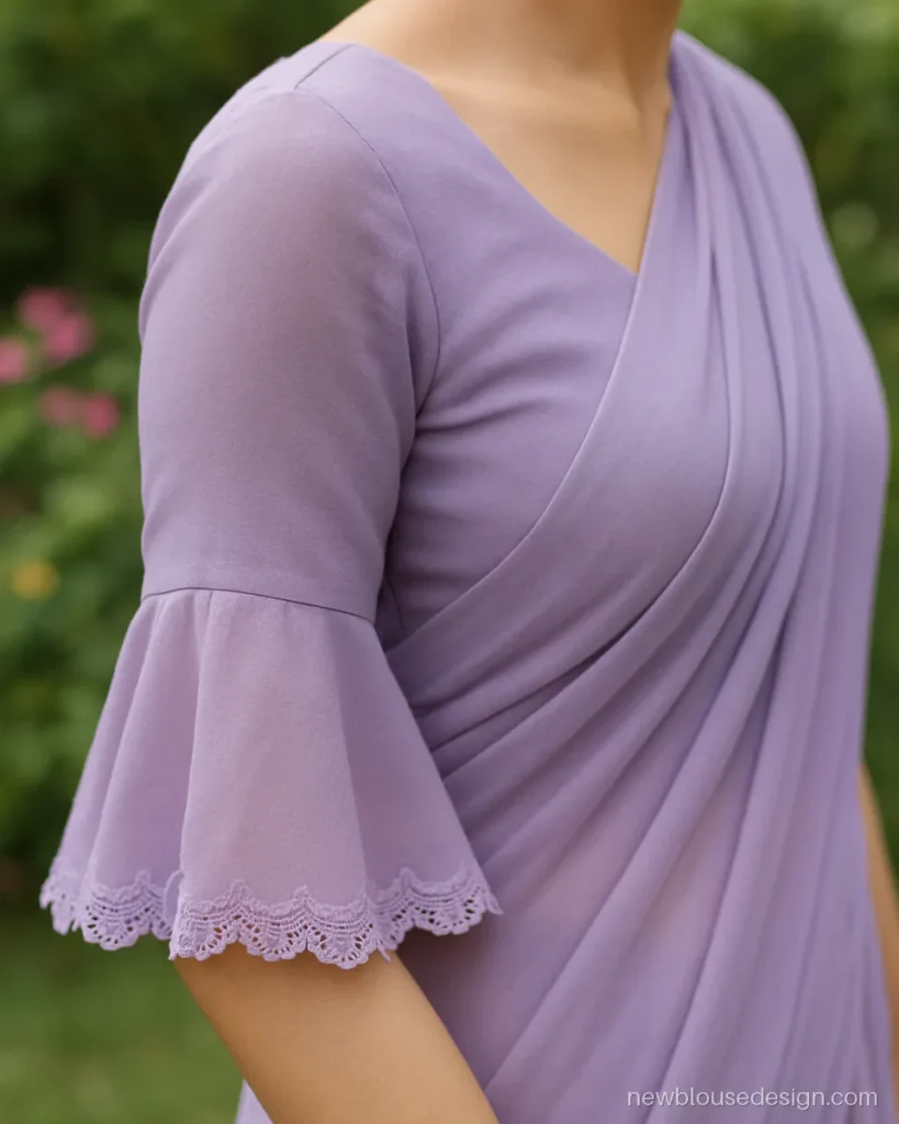 Lilac georgette blouse with bell sleeves and a lace edge