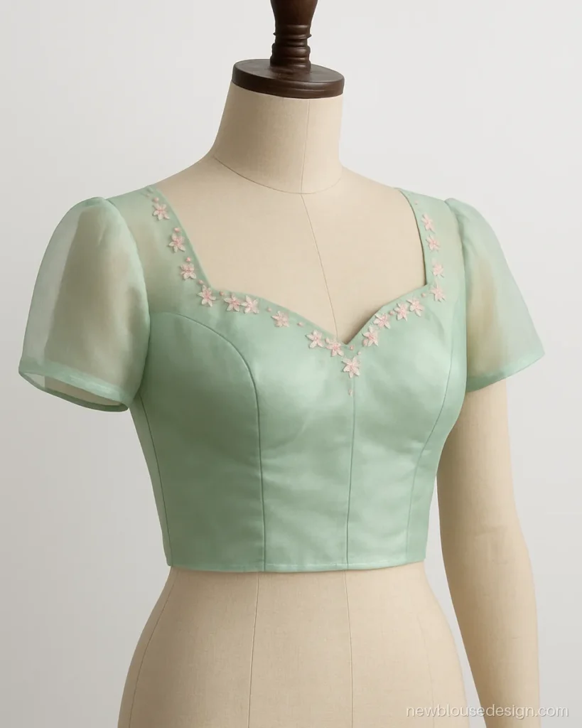 Mint organza sweetheart front blouse with tiny thread flowers along the neckline