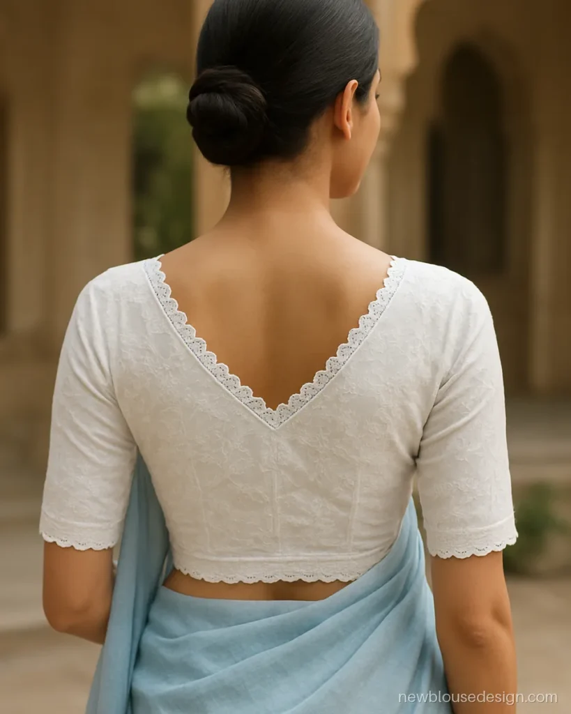 White chikankari cotton blouse back with V neck and scalloped embroidered border