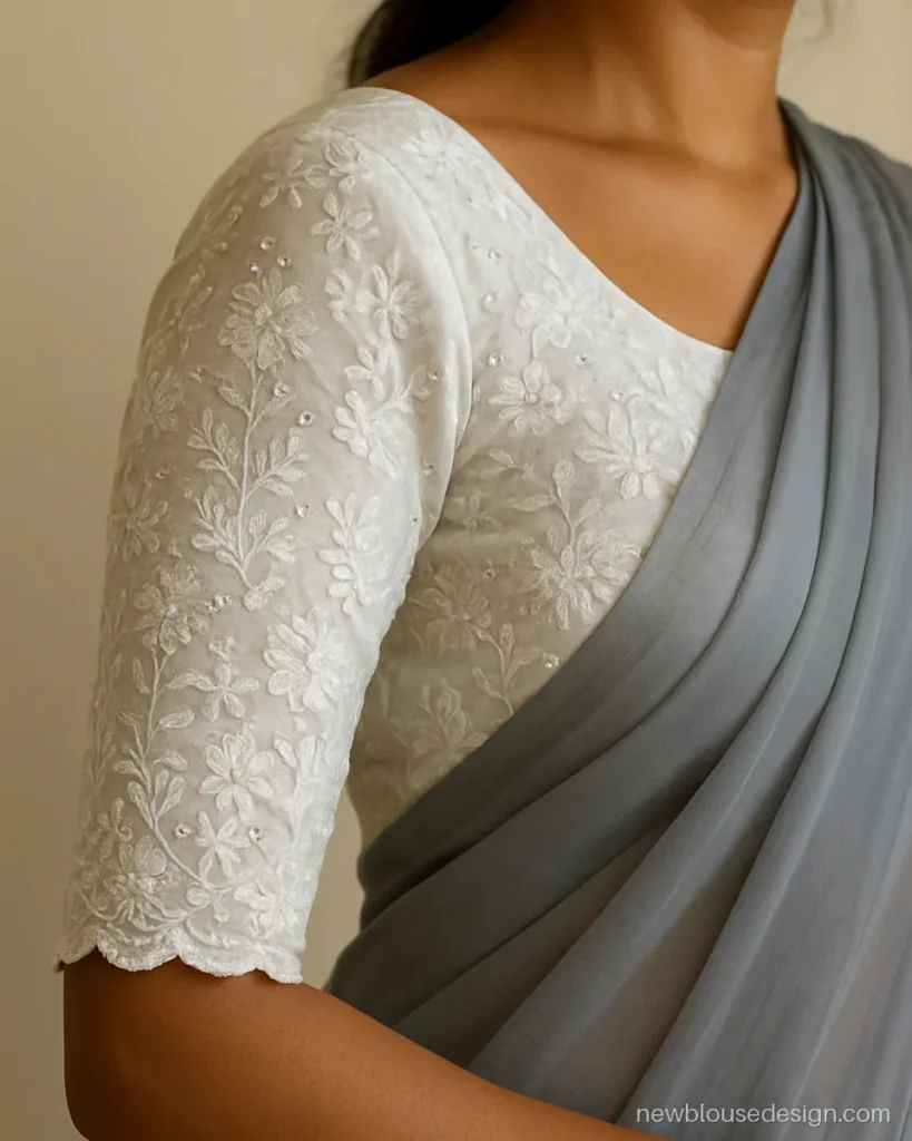 White chikankari elbow sleeve with mukaish silver dots and scalloped hem